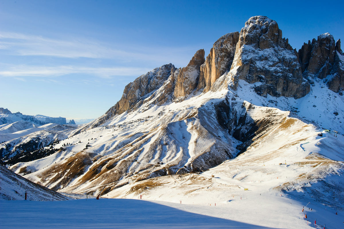Piste della Val Gardena in inverno ai piedi del Sassolungo, tappa del Gourmet Peaks Ski Safari
